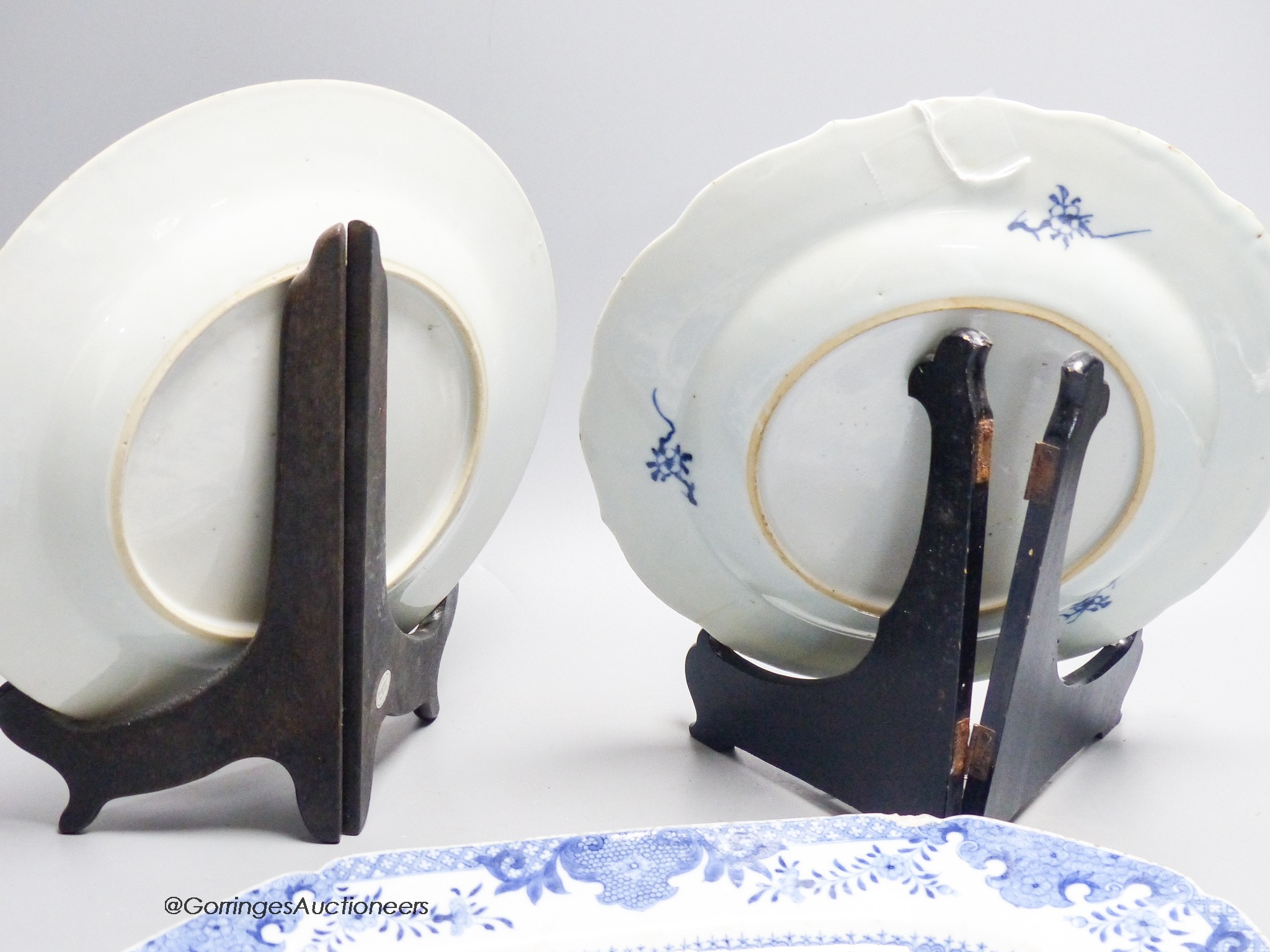 Two 18th century Chinese circular export plates and two canted rectangular dishes, 32 x 23cm